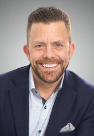 Zach Kwakenat headshot